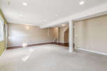 Discover this spacious finished basement, perfect for entertainment or relaxation.
