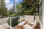 Enjoy outdoor living on this charming balcony, perfect for relaxing or entertaining.