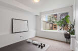 Transform this versatile room into your personal home gym or a productive office space.