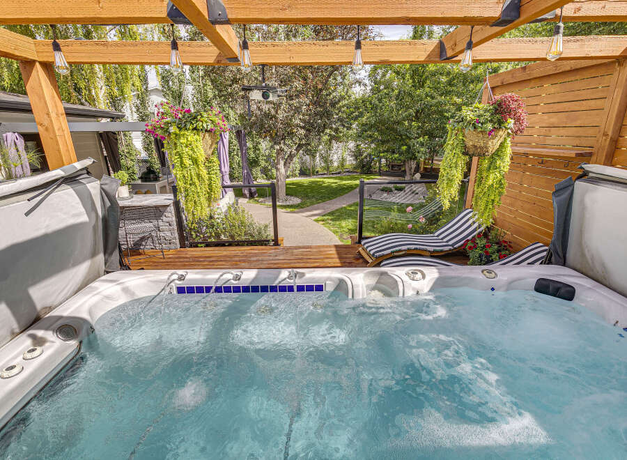 Indulge in ultimate relaxation with this luxurious hot tub, perfect for unwinding after a long day.