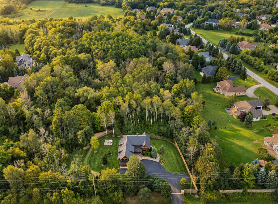 Discover this stunning property nestled amidst lush greenery and mature trees, offering unparalleled privacy and tranquility.