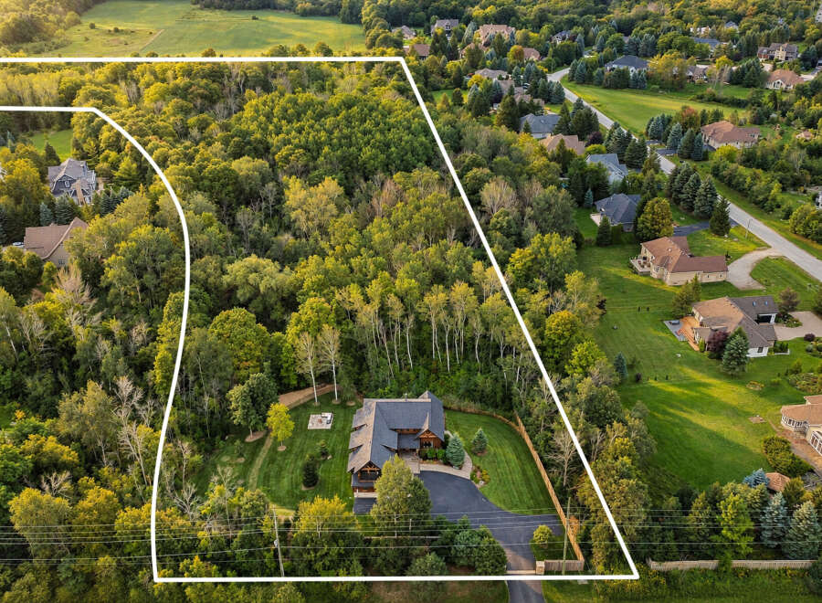 Discover this stunning property nestled amidst lush greenery and mature trees, offering unparalleled privacy and tranquility.