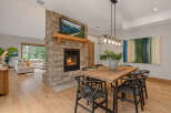 Experience the perfect blend of rustic charm and modern elegance in this stunning open-concept living and dining area.