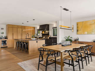Experience modern living in this stunning open-concept kitchen and dining area.