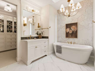 Indulge in luxury with this stunning bathroom featuring a freestanding soaking tub and elegant vanity.