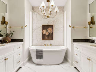 Indulge in luxury with this stunning bathroom featuring a freestanding soaking tub as the centerpiece.