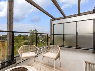 Enjoy breathtaking views from this spacious balcony, perfect for outdoor relaxation and entertaining.