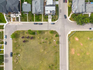 Discover modern living in this stunning aerial view of a suburban neighborhood.
