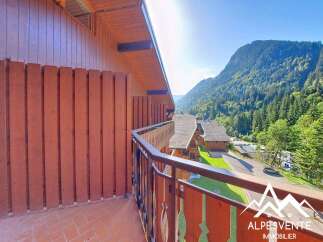 Enjoy breathtaking mountain views from this charming balcony, perfect for your morning coffee or evening relaxation.