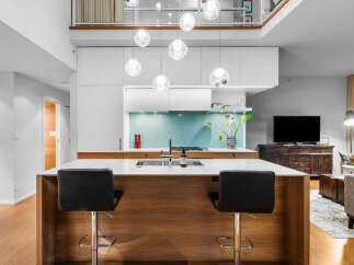 Experience modern living in this stunning open-concept kitchen and living area.