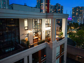 Experience luxury urban living in this stunning multi-level penthouse with breathtaking city views.