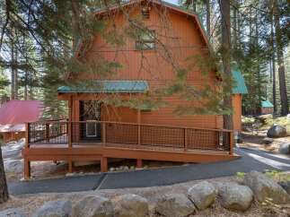 Experience rustic charm and modern accessibility in this charming cabin nestled among tall pine trees.