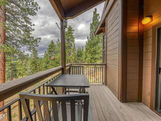 Enjoy the serene mountain views from this charming balcony, perfect for morning coffee or evening relaxation.