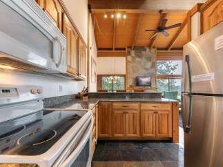 Experience the perfect blend of rustic charm and modern convenience in this stunning kitchen.