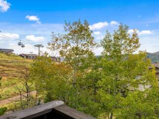 Experience breathtaking mountain views and convenient access to ski slopes from this stunning property.