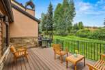 Enjoy outdoor living on this spacious deck, perfect for entertaining or relaxing.