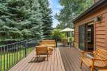 Enjoy the serene mountain setting from this spacious deck, perfect for outdoor entertaining or quiet relaxation.