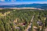 Nestled amidst a dense forest of mature pine trees, this property offers a serene and private retreat.