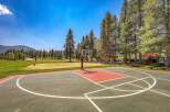 Enjoy outdoor recreation with a full-sized basketball court and a sand volleyball court, perfect for active living.