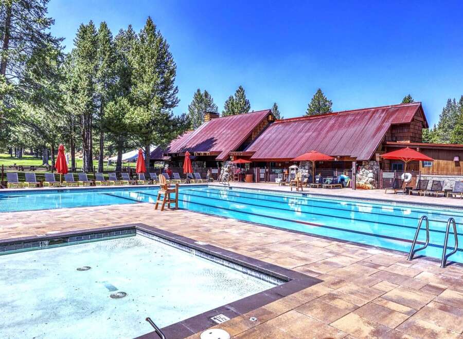 Enjoy a refreshing dip in this stunning resort-style swimming pool, complete with a separate shallow area perfect for relaxation.
