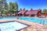 Enjoy a refreshing dip in this stunning resort-style swimming pool, complete with a separate shallow area perfect for relaxation.