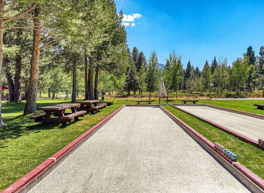 Enjoy outdoor recreation with multiple bocce ball courts and picnic areas set amidst a scenic park-like setting.