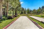 Enjoy outdoor recreation with multiple bocce ball courts and picnic areas set amidst a scenic park-like setting.