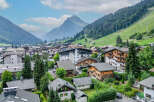 Discover this charming alpine village nestled amidst breathtaking mountain scenery.