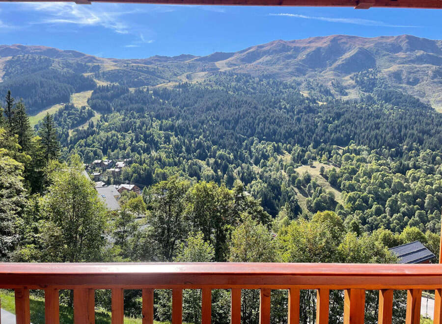 Experience breathtaking mountain views from this stunning property, nestled amidst lush green forests and rolling hills.