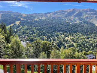 Experience breathtaking mountain views from this stunning property, nestled amidst lush green forests and rolling hills.
