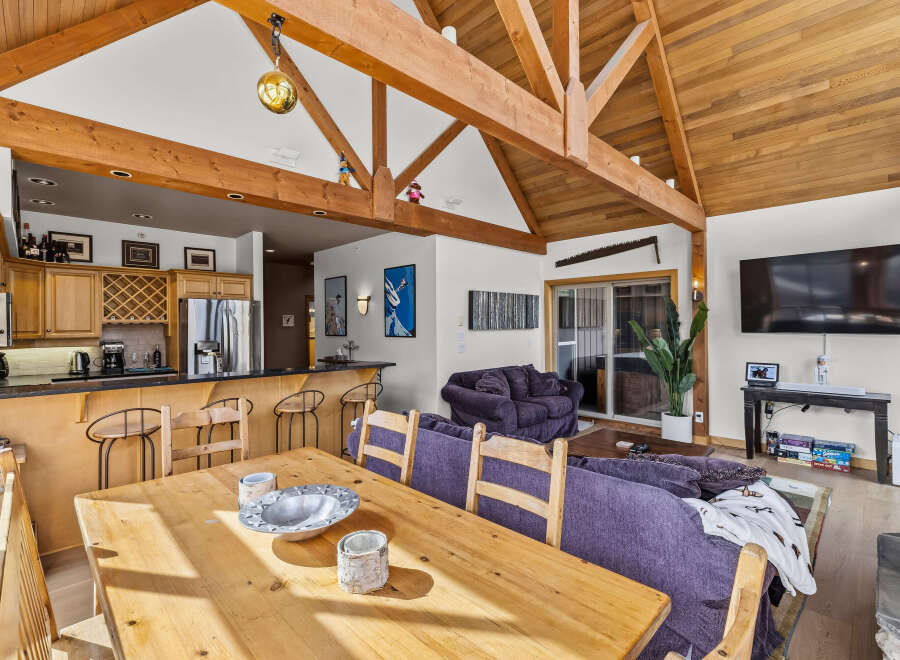 Experience the perfect blend of rustic charm and modern comfort in this spacious open-concept living area.