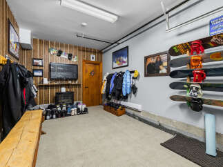 Gear up for your next adventure in this well-equipped ski and snowboard storage area.