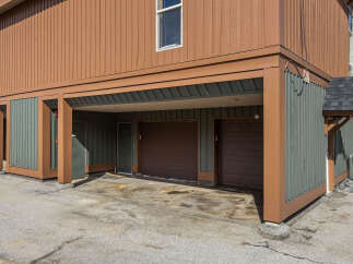 Discover convenient covered parking and garage spaces at this property, offering protection from the elements.