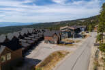 Discover this stunning mountain property featuring a collection of modern townhomes with classic ski lodge architecture.