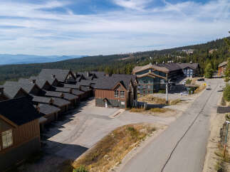 Discover this stunning mountain property featuring a collection of modern townhomes with classic ski lodge architecture.