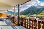 Enjoy breathtaking mountain views from this charming balcony, perfect for your morning coffee or evening relaxation.