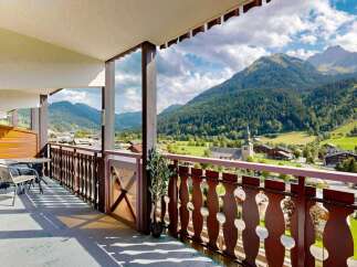 Enjoy breathtaking mountain views from this charming balcony, perfect for your morning coffee or evening relaxation.