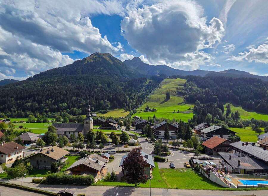 Discover this charming property nestled in a picturesque mountain village, offering breathtaking views of lush green slopes and majestic peaks.