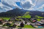 Discover this charming property nestled in a picturesque mountain village, offering breathtaking views of lush green slopes and majestic peaks.