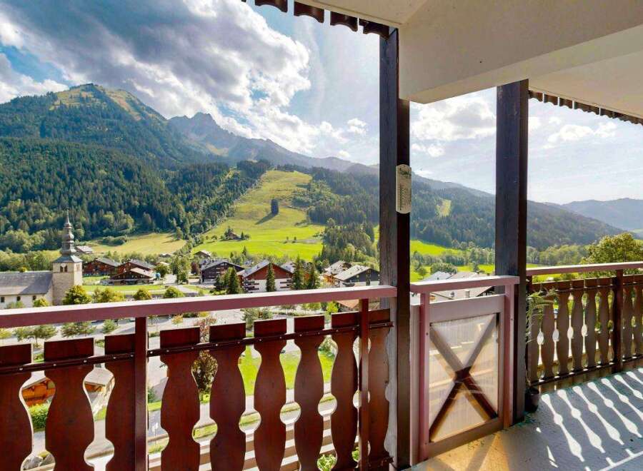 Experience breathtaking mountain views from this charming balcony, perfect for enjoying your morning coffee or evening wine.