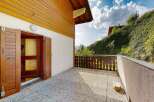 Step onto this charming patio, perfect for enjoying the fresh mountain air and scenic views.