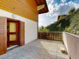 Step onto this charming patio, perfect for enjoying the fresh mountain air and scenic views.