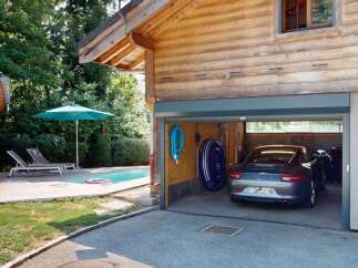 Experience luxury living with this stunning property featuring a private swimming pool and a spacious garage.