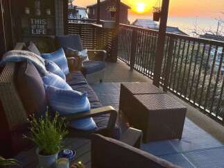 Enjoy breathtaking sunset views from this charming porch, perfect for relaxing evenings.