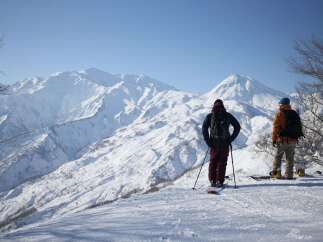 Experience the ultimate winter adventure with breathtaking panoramic views of snow-capped mountains.