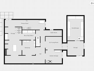 Discover a versatile lower level with dedicated spaces for fitness, workshops, and storage.