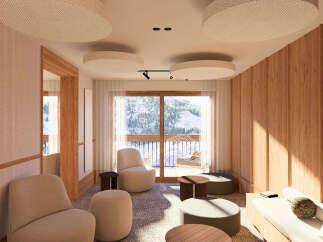 Experience ultimate relaxation in this cozy lounge area, featuring plush seating and a warm, wood-paneled ambiance.