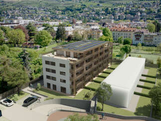 Experience modern living in this stunning apartment building, featuring a rooftop solar panel system for sustainable energy.