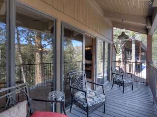 Enjoy the serene mountain views from this spacious balcony, perfect for morning coffee or evening relaxation.