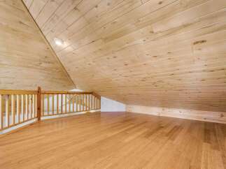 Discover this charming loft space, perfect for a cozy retreat or additional living area.